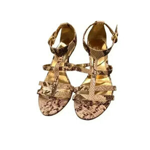 - Coach Python and Gold Heels.  Some wear on bottom.  Size 6B, Pre-Owned spring